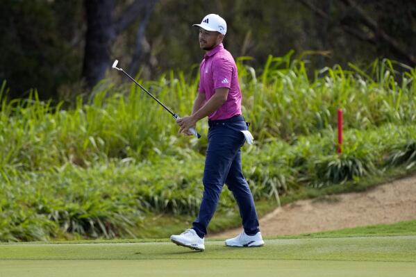 Xander Schauffele reacts after his shot on the 14th green during the second round of the Tournament of Champions golf event, Friday, Jan. 6, 2023, at Kapalua Plantation Course in Kapalua, Hawaii. (AP Photo/Matt York)