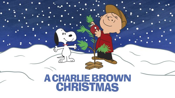 This image released by Apple shows key art for the animated classic "A Charlie Brown Christmas" holiday special. Apple and PBS have teamed up for ad free broadcasts of the special and “A Charlie Brown Thanksgiving.”  (Apple via AP)