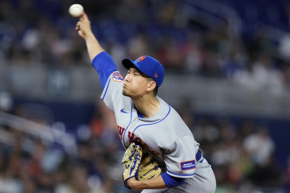 New York Mets starting pitcher Kodai Senga throws to a Miami Marlins batter during the fourth inning of a baseball game Wednesday, Sept. 20, 2023, in Miami. (AP Photo/Lynne Sladky)