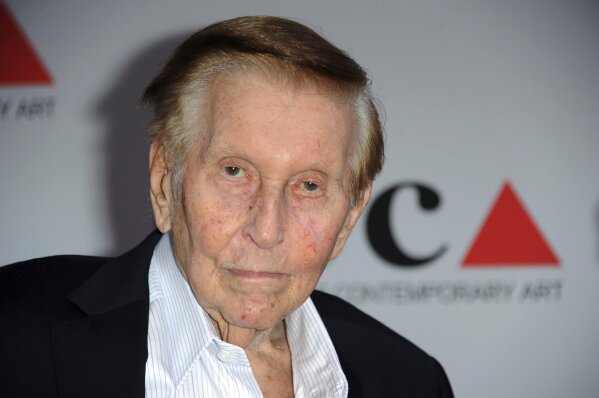 FILE - In this April 20, 2013, file photo, media mogul Sumner Redstone arrives at the 2013 MOCA Gala celebrating the opening of the Urs Fischer exhibition at MOCA, in Los Angeles.  Redstone, the strong-willed media mogul whose public disputes with family members and subordinates made him a feared operator in Hollywood, died Wednesday, Aug. 12, 2020. (Photo by Richard Shotwell/Invision/AP, File)