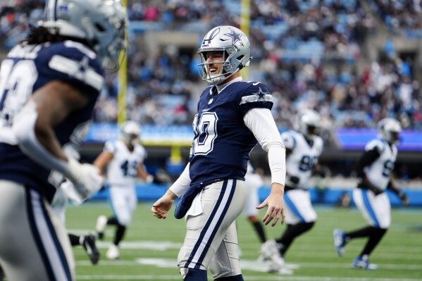 Rush throws for career-high 3 TDs, Cowboys force 4 turnovers to beat Panthers 30-14 | AP News
