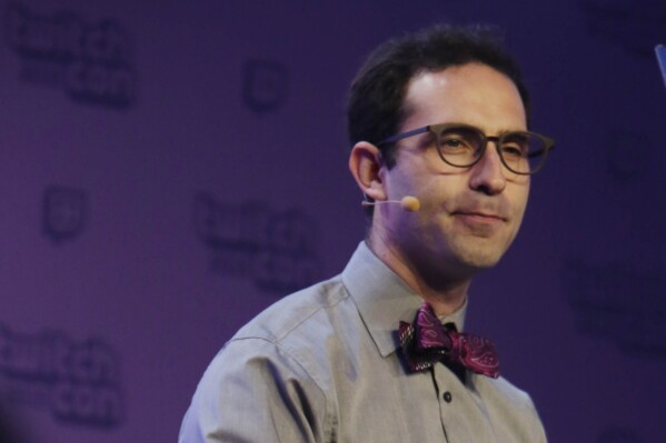 Then-Twitch CEO Emmett Shear speaks during the keynote address during Twitchcon at Moscone West in San Francisco on September 25, 2015. OpenAI is bringing in the former head of Twitch as interim CEO just days after the company pushed out its well-known leader Sam Altman, sparking upheaval in the AI world. Emmett Shear announced his new role Monday, Nov. 20, 2023, in a post on X. (Lea Suzuki/San Francisco Chronicle via AP)