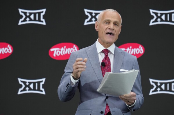 Big 12 Commissioner Brett Yormark speaks during Big 12 NCAA college football media days in Las Vegas Tuesday, July 9, 2024. (AP Photo/Lucas Peltier)