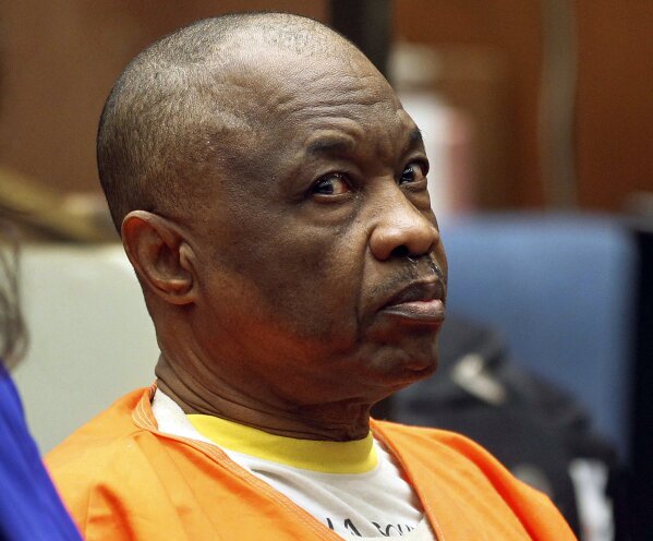 FILE - In this Feb. 6, 2015, file photo, Lonnie Franklin Jr., who has been dubbed the "Grim Sleeper" serial killer, sits during a court hearing in Los Angeles. Lonnie Franklin has died in a California prison. He was 67. Corrections officials said Franklin was found unresponsive in his cell at San Quentin State Prison Saturday, March 28, 2020. An autopsy will determine the cause of death; however, there were no signs of trauma, corrections spokeswoman Terry Thornton said in a statement. (AP Photo/Nick Ut, File)