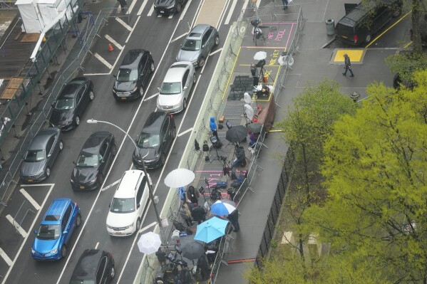 Television crews are set up across the street from Manhattan criminal court before the start of former President Donald Trump's trial, Thursday, April 18, 2024 in New York. (AP Photo/Mary Altaffer, Pool)