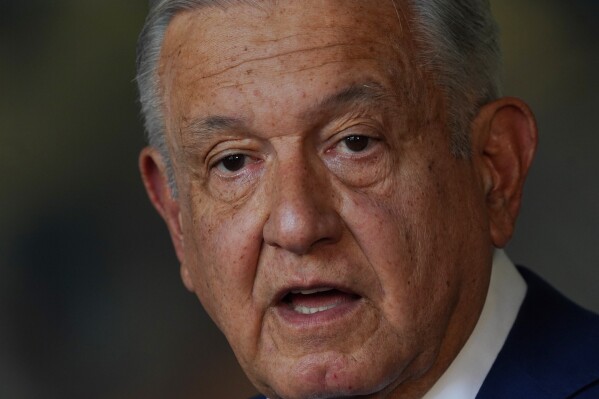 FILE - Mexican President Andres Manuel Lopez Obrador speaks during his State of the Nation address at the National Palace in Mexico City, Sept. 1, 2022. López Obrador apologized on Jan. 9, 2024 for referring to a trans congresswoman from his party Salma Luévano as 