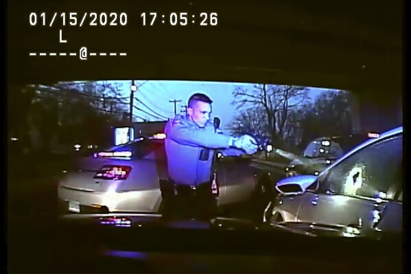 FILE - This Jan. 15, 2020, image taken from dashboard camera video released by the Connecticut State Police, shows Trooper Brian North, left, after he discharged his weapon beside a vehicle stopped in West Haven, Conn. Jury selection is scheduled to begin Wednesday, Feb. 21, 2024, in North's trial. North has pleaded not guilty to first-degree manslaughter with a firearm in the death of Mubarak Soulemane in West Haven. (Connecticut State Police via AP, File)