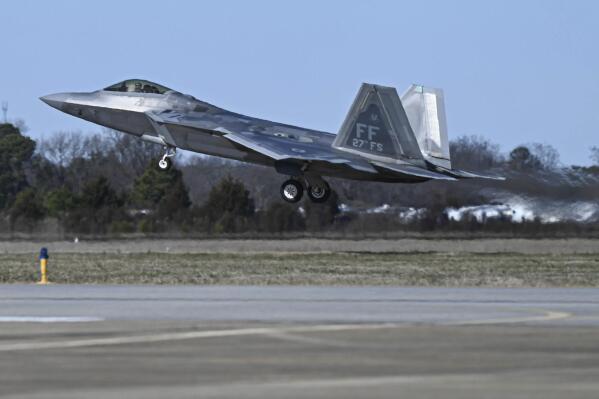 This photo provided by the U.S. Air Force shows a U.S. Air Force pilot taking off in an F-22 Raptor at Joint Base Langley-Eustis, Va., Saturday, Feb. 4, 2023. At the direction President Joe Biden, military aircraft brought down a high altitude surveillance balloon off the coast of South Carolina. (Airman 1st Class Mikaela Smith/U.S. Air Force via AP)