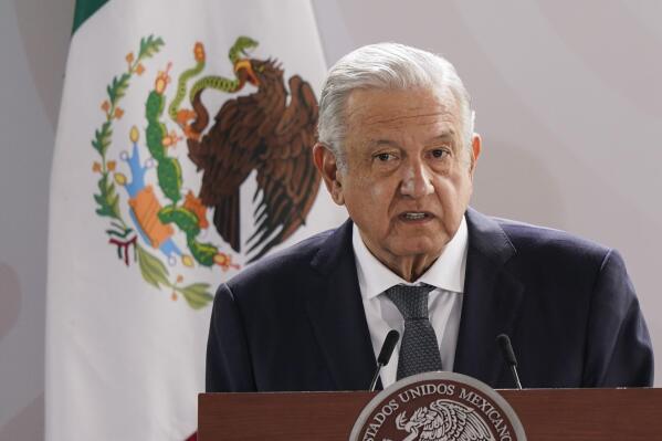 FILE - Mexican President Andres Manuel Lopez Obrador speaks during a ceremony to commemorate in Mexico City's main square the Zocalo, Aug. 13, 2021. Lopez Obrador vowed to press ahead with changes to the electrical power industry despite U.S. concerns that they could close off markets, choke competition and possibly violate the U.S.-Mexico-Canada free trade pact, during his daily press briefing on Thursday, Feb. 10, 2022. (AP Photo/Eduardo Verdugo, File)