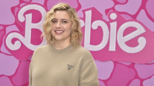 Greta Gerwig arrives at a photo call for 