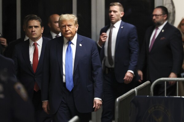 Former president Donald Trump leaves Trump Tower on his way to Manhattan criminal court, Monday, April 22, 2024, in New York. Opening statements in Donald Trump's historic hush money trial are set to begin. Trump is accused of falsifying internal business records as part of an alleged scheme to bury stories he thought might hurt his presidential campaign in 2016. (AP Photo/Stefan Jeremiah)