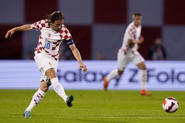 Croatia's Luka Modric is in action during the UEFA Nations League soccer match between Croatia and Denmark at the Maksimir stadium in Zagreb, Croatia, Thursday, Sept. 22, 2022. (AP Photo/Darko Bandic)