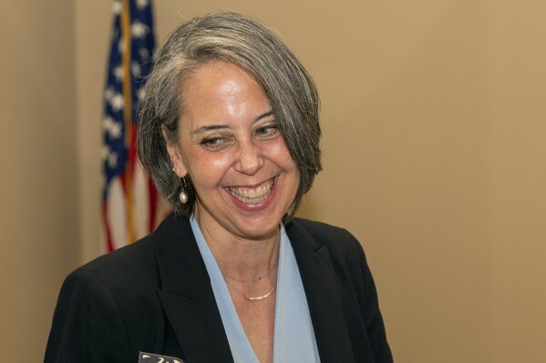 Lisa Forbes, the Democratic candidate for the Ohio Supreme Court, smiles as she talks with attendees at the Woman's Empowerment Luncheon in Richmond Heights, Ohio, Saturday, March 9, 2024. Forbes is currently an Ohio Court of Appeals Judge. The Ohio Supreme Court’s 4-3 Republican majority could flip to Democrats’ favor in the fall if the party sweeps the three seats up for election this year. (AP Photo/Phil Long)