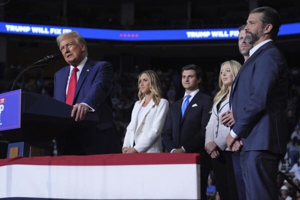 Republican presidential nominee former President Donald Trump speaks at a campaign rally at PPG Paints Arena, Monday, Nov. 4, 2024, in Pittsburgh, Pa., as Lara Trump, Michael Boulos, Tiffany Trump, Eric Trump and Donald Trump Jr., listen. (AP Photo/Evan Vucci)