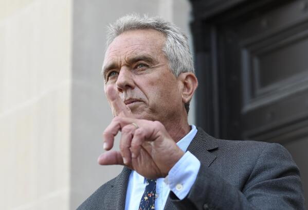 FILE - Robert F. Kennedy, Jr. speaks after a hearing challenging the constitutionality of the state legislature's repeal of the religious exemption to vaccination on behalf of New York state families who held lawful religious exemptions, during a rally outside the Albany County Courthouse, Aug. 14, 2019, in Albany, N.Y.  Kennedy is apologizing for suggesting things are worse for people today than they were for Anne Frank, the teenager who died in a Nazi concentration camp after hiding with her family in a secret annex for two years. Kennedy’s comments were made at a Washington rally on Sunday put on by his anti-vaccine nonprofit group. (AP Photo/Hans Pennink, File)