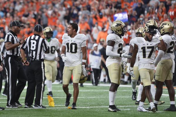 Purdue players react to the officials leading to an ejection for Purdue safety Chris Jefferson (17) after Syracuse scored the game-winning touchdown late in the second half of an NCAA college football game in Syracuse, N.Y., Saturday, Sept. 17, 2022. Syracuse won 32-29. (AP Photo/Adrian Kraus)