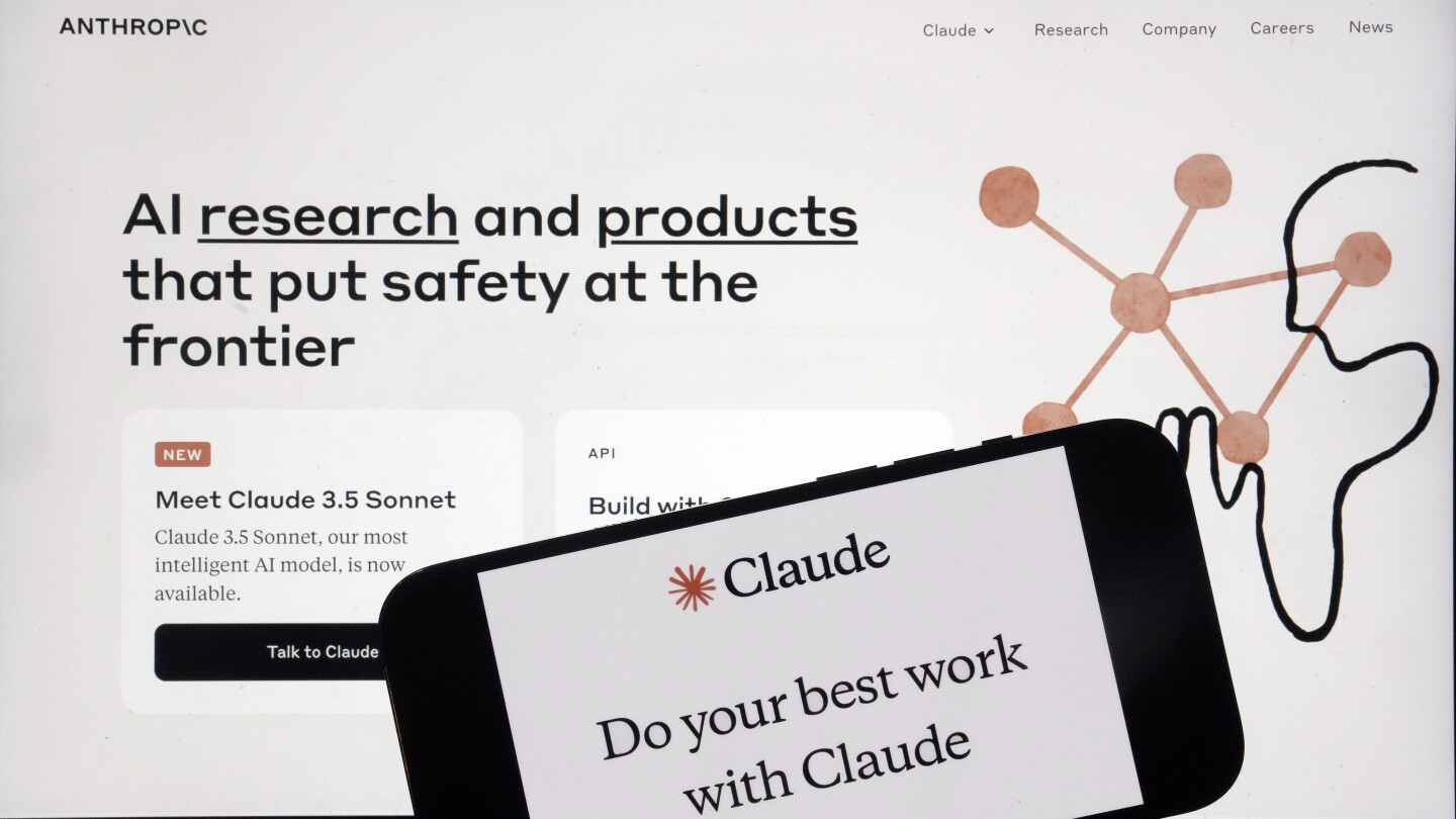 FILE - The Anthropic website and mobile phone app are shown in this photo, in New York, July 5, 2024. (AP Photo/Richard Drew, File) A group of authors