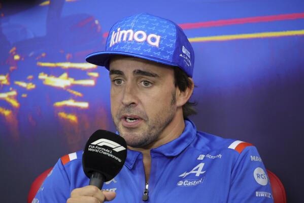 Alpine driver Fernando Alonso of Spain speaks during a media conference ahead of the Formula One Grand Prix at the Spa-Francorchamps racetrack in Spa, Belgium, Thursday, Aug. 25, 2022. The Belgian Formula One Grand Prix will take place on Sunday. (AP Photo/Olivier Matthys)