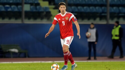 FILE - Russia's Daler Kuzyaev in actions during the Euro 2020 group I qualifying soccer match between San Marino and Russia, in San Marino, Tuesday, Nov. 19, 2019. Russia midfielder Daler Kuzyaev has signed a two-year deal with French club Le Havre. The newly-promoted club from the port city in the Normandy region said Kuzyaev, who signed from Zenit St. Petersburg, will join his new teammates in the coming days. (AP Photo/Marco Vasini, File)