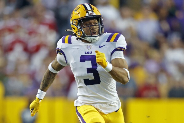 FILE - LSU safety Greg Brooks Jr. (3) runs during the first half of an NCAA college football game against Alabama in Baton Rouge, La., Saturday, Nov. 5, 2022. Brooks has been diagnosed with medulloblastoma, a rare form of brain cancer, his family and the hospital caring for him announced Wednesday, Oct. 4, 2023. (AP Photo/Tyler Kaufman, File)