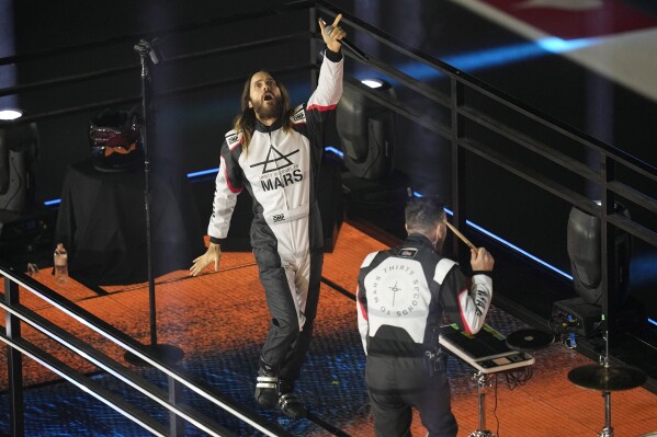 Jared Leto of Thirty Seconds to Mars performs during an opening ceremony for the Formula One Las Vegas Grand Prix auto race, Wednesday, Nov. 15, 2023, in Las Vegas. (AP Photo/Darron Cummings)