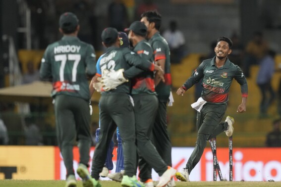 Bangladesh's team members celebrate their six runs win over India in the Asia Cup cricket match between Bangladesh and India in Colombo, Sri Lanka, Friday, Sept.15, 2023. (AP Photo/Eranga Jayawardena)