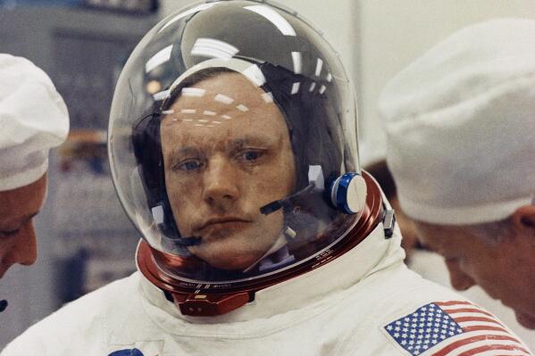 FILE - This 1969 file photo shows astronaut Neil Armstrong in space suit. On Wednesday, Aug. 11, 2021, the NASA Plum Brook Station in Sandusky, Ohio was officially renamed after Armstrong, who was born in the state and returned shortly after he became the first man to walk on the moon. (AP Photo)
