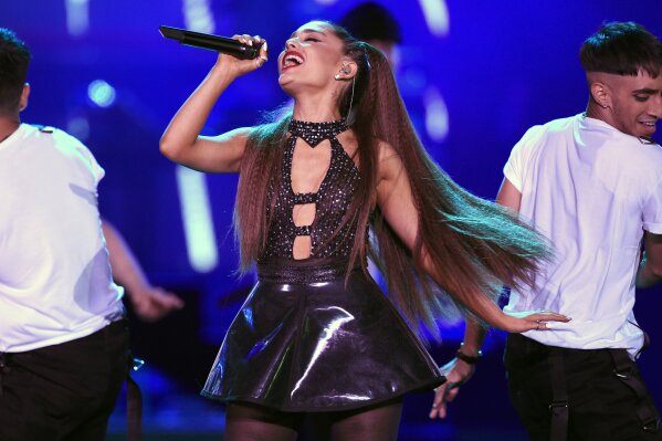 
              FILE - In this June 2, 2018 file photo, Ariana Grande performs at Wango Tango in Los Angeles. Billboard named the 25-year-old award-winning singer its 2018 Woman of the Year. Grande will receive the award at Billboard’s 13th annual Women in Music event on Dec. 6 in New York. (Photo by Chris Pizzello/Invision/AP, File)
            