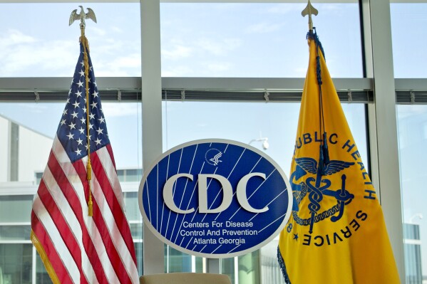 A Centers for Disease Control and Prevention logo, center, is displayed at the agency's federal headquarters in Atlanta on Nov. 19, 2013. (AP Photo/David Goldman, File)
