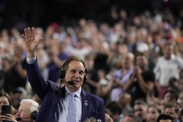 Jim Nantz waves to the crowd during the Florida Atlantic and San Diego State Final Four college basketball game in the NCAA Tournament on Saturday, April 1, 2023, in Houston. Nantz's near four-decade career covering March Madness ends after Monday's final between UConn and San Diego State. (AP Photo/Brynn Anderson)