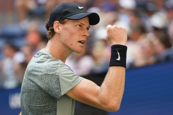Jannik Sinner, of Italy, reacts after scoring a point against Mackenzie McDonald, of the United States, during the first round of the U.S. Open tennis championships, Tuesday, Aug. 27, 2024, in New York. (AP Photo/Kirsty Wigglesworth)