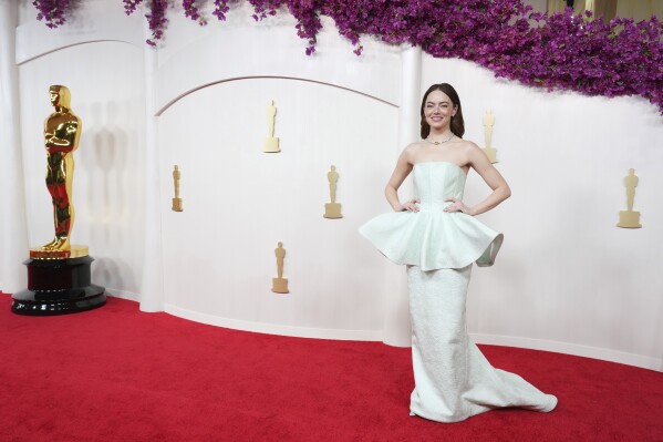 Emma Stone arrives at the Oscars on Sunday, March 10, 2024, at the Dolby Theatre in Los Angeles. (Photo by Jordan Strauss/Invision/AP)