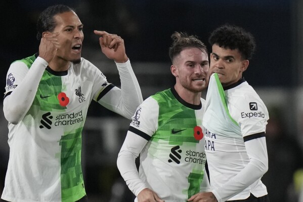 Liverpool's Luis Diaz celebrates after scoring his side's first goal during the English Premier League soccer match between Luton Town and Liverpool, at Kenilworth Road, in Luton, England, Sunday, Nov. 5, 2023.Luis Diaz has returned to Liverpool's squad for its Premier League match against Luton with his father still missing after being kidnapped by a guerrilla group in Colombia. (Alastair Grant)