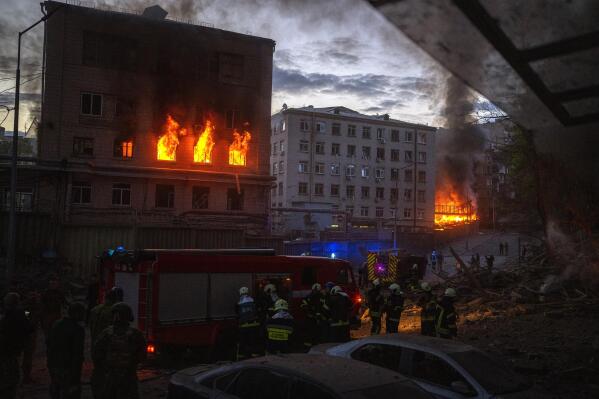 Emergency services are working in the area following an explosion in Kyiv, Ukraine on Thursday, April 28, 2022. Russia struck the Ukrainian capital of Kyiv shortly after a meeting between President Volodymyr Zelenskyy and U.N. Secretary-General António Guterres on Thursday evening. (AP Photo/Emilio Morenatti)