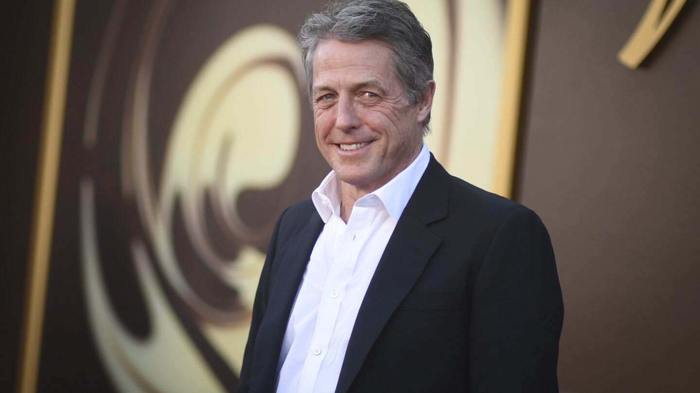 Hugh Grant settles lawsuit alleging illegal hacking by The Sun newspaper