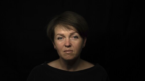 Olena Yahupova sits for a portrait in Zaporizhzhia, Ukraine, Thursday, May 18, 2023. Yahupova, a city administrator who was forced to dig trenches for the Russian forces in Zaporizhzhia, says, “If we don’t talk about it and keep silent, then tomorrow anyone can be there— my neighbor, acquaintance, child.” (AP Photo/Evgeniy Maloletka)