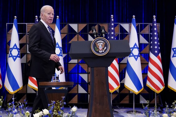 FILE - President Joe Biden walks to the podium to deliver remarks on the war between Israel and Hamas after meeting Israeli Prime Minister Benjamin Netanyahu, Wednesday, Oct. 18, 2023, in Tel Aviv. Democratic views on how President Joe Biden is handling the decades-old conflict between Israelis and Palestinians have rebounded slightly, according to a new poll from 鶹ýapp-NORC Center for Public Affairs Research. (APPhoto/Evan Vucci, File)