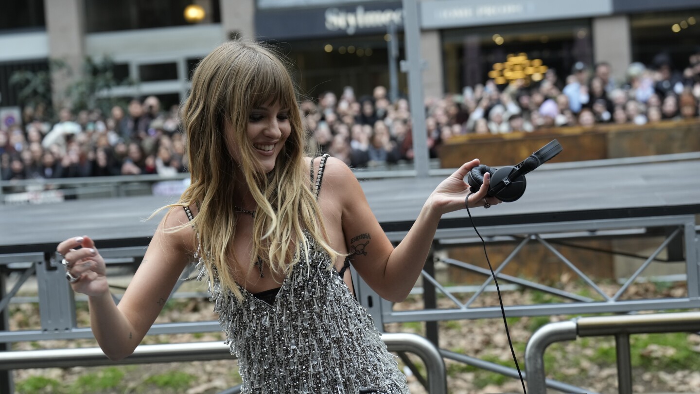Rocker Victoria De Angelis spins a DJ set as Dolce & Gabbana's Milan show spills onto the streets