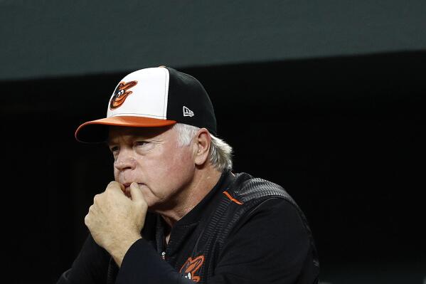FILE - Baltimore Orioles manager Buck Showalter stands in the dugout in the second inning of a baseball game against the Oakland Athletics, Thursday, Sept. 13, 2018, in Baltimore. Buck Showalter has been hired as the New York Mets manager, bringing him back to the Big Apple to take over his fifth major league team. (AP Photo/Patrick Semansky, File)