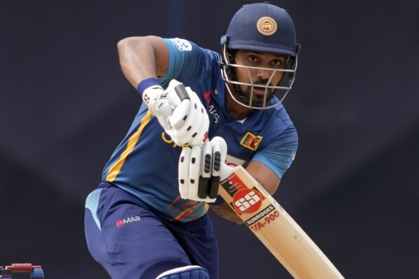 FILE - Sri Lanka's Danushka Gunathilaka bats during the fifth one-day international cricket match between Australia and Sri Lanka in Colombo, Sri Lanka, on June 24, 2022. Sri Lankan cricket international Danushka Gunathilaka has been found not guilty of raping a woman he met on a dating site during the south Asian team's tour of Australia in November 2022. (AP Photo/Eranga Jayawardena, File)