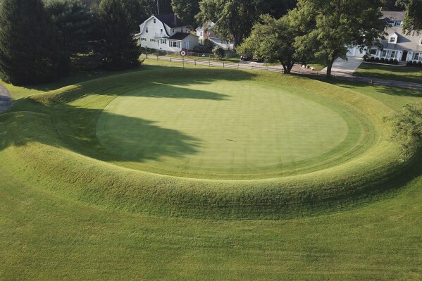 FILE - A 155-foot diameter circular enclosure around hole number 3 at Moundbuilders Country Club at the Octagon Earthworks in Newark, Ohio, is pictured July 30, 2019. A trial was slated to begin Tuesday, May 28, 2024, to determine how much the historical society must pay for the ancient ceremonial and burial earthworks, which is among eight ancient areas in the Hopewell Earthworks system named a World Heritage Site last year. (Doral Chenoweth III/The Columbus Dispatch via AP, File)