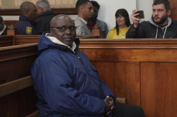 Fulgence Kayishema sits in the Magistrate's Court in Cape Town, South Africa, Friday, May 26, 2023. Kayishema, a former police officer, is one of the most wanted suspects in Rwanda's genocide and is suspected of orchestrating the killing of some 2,000 people nearly three decades ago. He was arrested in South Africa after 22 years on the run, a special tribunal set up by the United Nations to find the perpetrators said Thursday. (AP Photo/Nardus Engelbrecht)