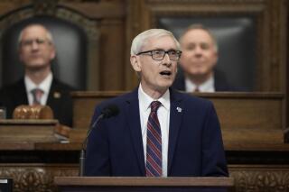 FILE - Wisconsin Gov. Tony Evers speaks during the annual State of the State address, Jan. 24, 2023, in Madison, Wis. Evers said Tuesday, March 7, that he would consider rejecting a Republican budget plan that does not significantly increase pay for corrections officers, prosecutors and public defenders. (AP Photo/Morry Gash, File)