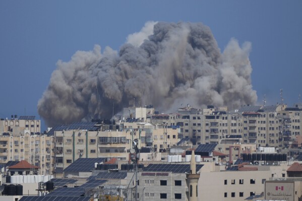 Smoke rises following an Israeli airstrike in Gaza City, Thursday, Oct. 12, 2023. An Israeli ground offensive in Gaza would further escalate the war raging since Hamas launched its unprecedented attack days ago. The United States already deployed one aircraft carrier group to the region, with another on the way. That reflects concerns of a widening conflict and is meant to deters Iran and others. (AP Photo/Hatem Moussa)