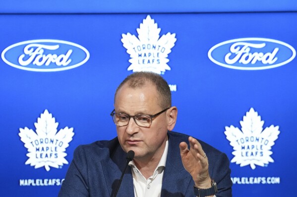 New Toronto Maple Leafs general manager Brad Treliving speaks to the media during an NHL hockey press conference in Toronto, Friday, May 10, 2024. (Nathan Denette/The Canadian Press via AP)