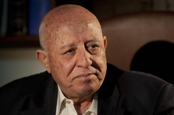 FILE - Former Palestinian Prime Minister Ahmed Qureia looks on during an interview with The Associated Press in his office in Abu Dis, near Jerusalem, Monday, April 23, 2012. Qureia, a former architect of interim peace deals with Israel, has died Wednesday, Feb. 22, 2023, at age 85. (AP Photo/Sebastian Scheiner, File)