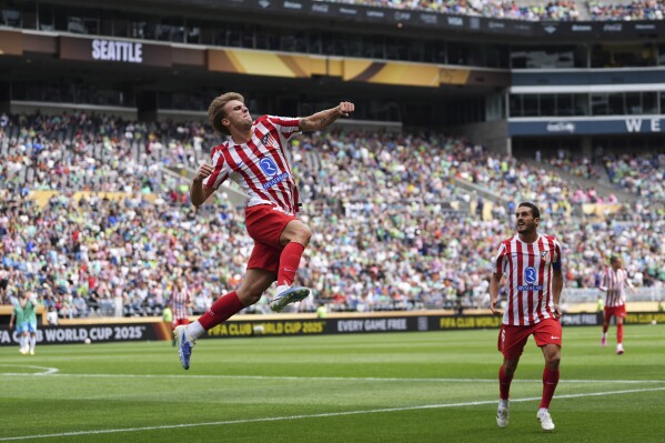 Atletico Madrid's Pablo Barrios celebrates scoring his side's opening goal during the Club World Cup group B soccer match between Seattle Sounders and Atletico Madrid in Seattle, Thursday, June 19, 2025. (AP Photo/Lindsey Wasson)