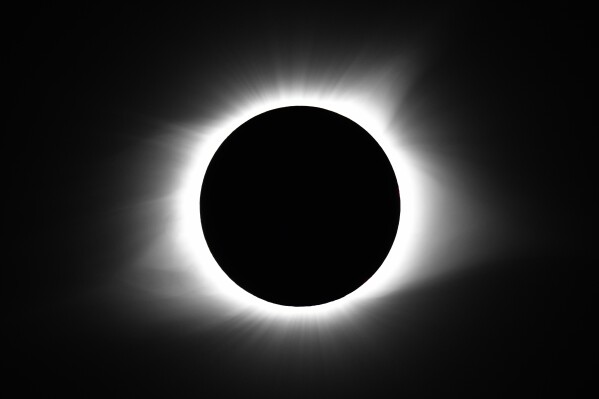 FILE - The moon covers the sun during a total solar eclipse Monday, Aug. 21, 2017, in Cerulean, Ky. On April 8, 2024, the sun will pull another disappearing act across parts of Mexico, the United States and Canada, turning day into night for as much as 4 minutes, 28 seconds. (AP Photo/Timothy D. Easley, File)