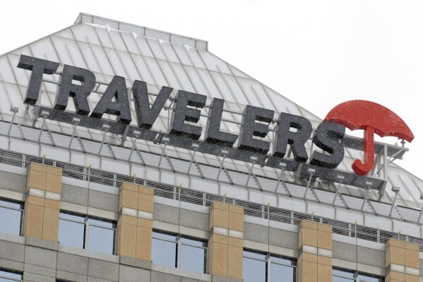 FILE - The Travelers company headquarters in St. Paul, Minn., Jan. 25, 2010. Travelers Cos. reports quarterly financial results, Thursday, Jan. 21, 2016. Property casualty insurance provider The Travelers Cos. moved to a loss in its 2023 second quarter as wind and hail storms in several states brought about an increase in claims. (AP Photo/Jim Mone, File)