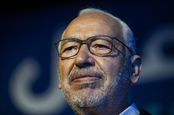FILE - Islamist party leader and parliament speaker Rached Ghannouchi speaks during a meeting in Tunis, Tunisia, on Oct. 3, 2019. Family members of jailed lawyers and politicians, including Ghannouchi, in Tunisia want the International Criminal Court to investigate claims of political persecution and human rights violations as an increasing number of President Kais Saied's opponents are arrested and several in prison stage hunger strikes. Jailed dissidents' sons and daughters in The Hague, Netherlands, on Thursday, Oct. 5, 2023, will announce plans to pursue action at the court. (AP Photo/Hassene Dridi, File)